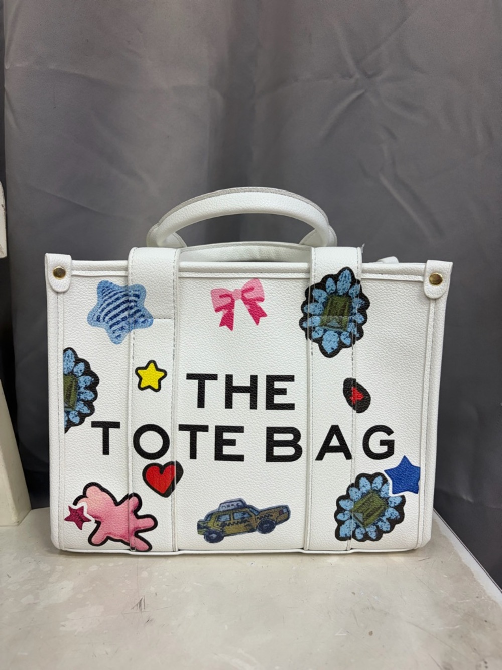 White graphic handbag